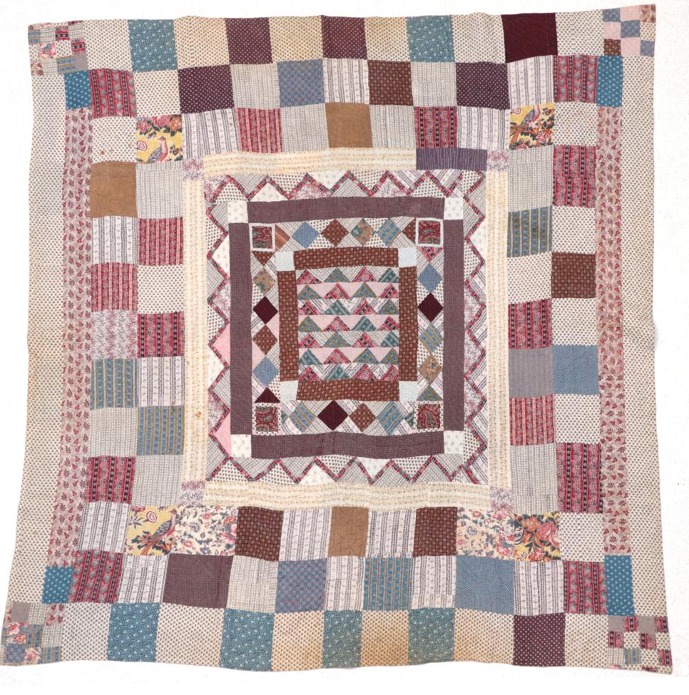 Circa 1810-1830 Printed Cotton Patchwork Quilt, comprising multi frames with central panel of