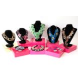 Five Necklaces and Three Necklace and Earring Sets, by Butler & Wilson, comprising of a black,