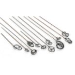 Twelve Assorted Charles Horner Decorative Silver Hat Pins, including examples of curvilinear design,