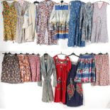 Assorted Circa 1950s Printed Cotton Pinafores, House Coats and Skirts, eight housecoats with