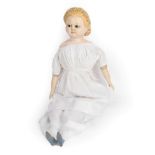 Circa 1869 Wax Over Pumpkin Head Doll, with moulded blond hair, glass eyes, painted cheeks and lips,