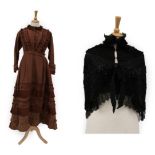 Late Victorian Brown Silk Dress with pleated trims to the bodice and skirt; and a Black Silk Capelet
