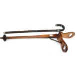 An Edwardian Satin Birch Shooting Stick, 83cm long; and A 1930's Metal Shooting Stick, 77cm long (