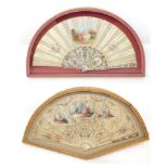 Two Framed and Glazed Folding Hand Fans, comprising a mid-18th century example with ivory monture,