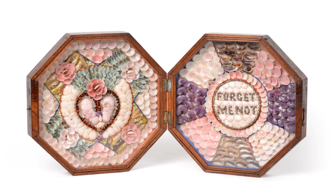 A Sailor's Shellwork Double Valentine, circa 1860, worked in coloured shells with a heart and