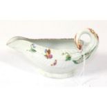 A Worcester Porcelain Cos Lettuce Leaf Sauceboat, circa 1755, painted with insects and flower