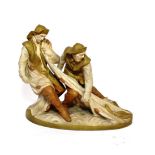 A Royal Dux Bisque Porcelain Figure Group, 20th century, as two fishermen hauling in a net of