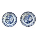 A Pair of Chinese Porcelain Plates, Qianlong, painted in underglaze blue with a figure and