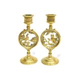 A Pair of Victorian Brass Candlesticks, cast and pierced with a cockerel and owl representing night