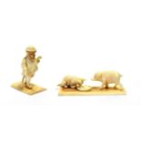 An Austrian Ivory Anthropomorphic Figure of a Pup, circa 1900, walking on its hind legs wearing a