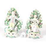 A Pair of Derby Porcelain Candlestick Figures, circa 1770, as a shepherd and shepherdess seated