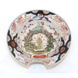 An Imari Porcelain Barber's Bowl, early 18th century, of typical form, painted with foliage in a
