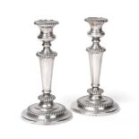 A Pair of George IV Silver Candlesticks, by Waterhouse, Hodson and Co., Sheffield, 1822, each on