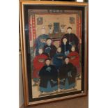 Chinese School (Qing Dynasty) An Ancestor Portrait, depicting nine seated figures before a table