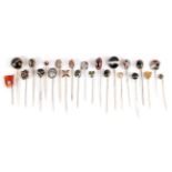 Twenty-Three Stick Pins; including a carbuncle garnet and seed pearl atop a banded agate example,