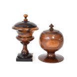 A Treen Pedestal Cup and Cover, 19th century, of campana form, 26cm high; and A Similar Ovoid Cup