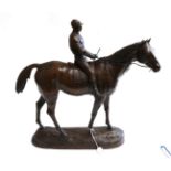 Paul Comolera (French, 1818-1897): A Bronze Racehorse with Jockey Up, on a mound base, signed P