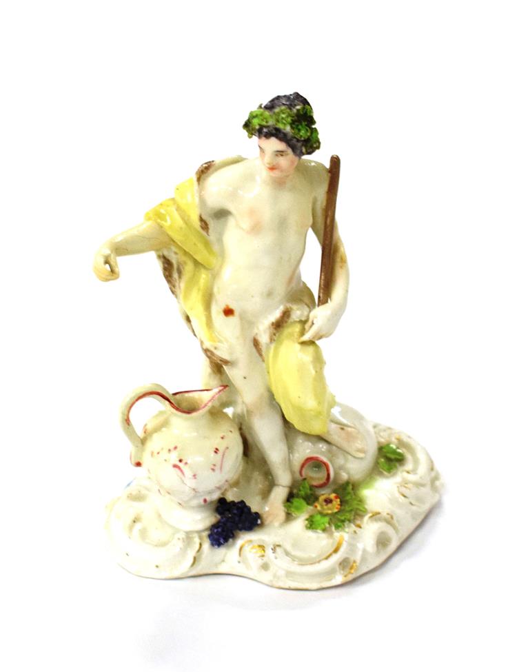 A Meissen Porcelain Figure of a Classical Youth Representing Autumn, circa 1750, standing wearing