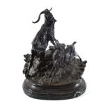 After Jules Moigniez: A Bronze Group of Two Goats, on a rocky outcrop, signed, 29cm high, on a