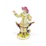 A Bow Porcelain Commedia dell'Arte Figure of Pierrot, circa 1760, standing wearing a pink hat and