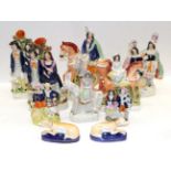 A Collection of Staffordshire Figures, mid 19th century, including Gypsy Girl, 22cm high, a pair