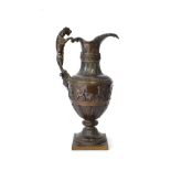 A Bronze Ewer, in Renaissance style, of baluster form with Puma handle cast with figures and