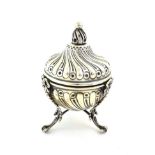 A Victorian Silver Sugar-Bowl and Cover, by William Comyns, London, 1899, spiral-fluted tapering and