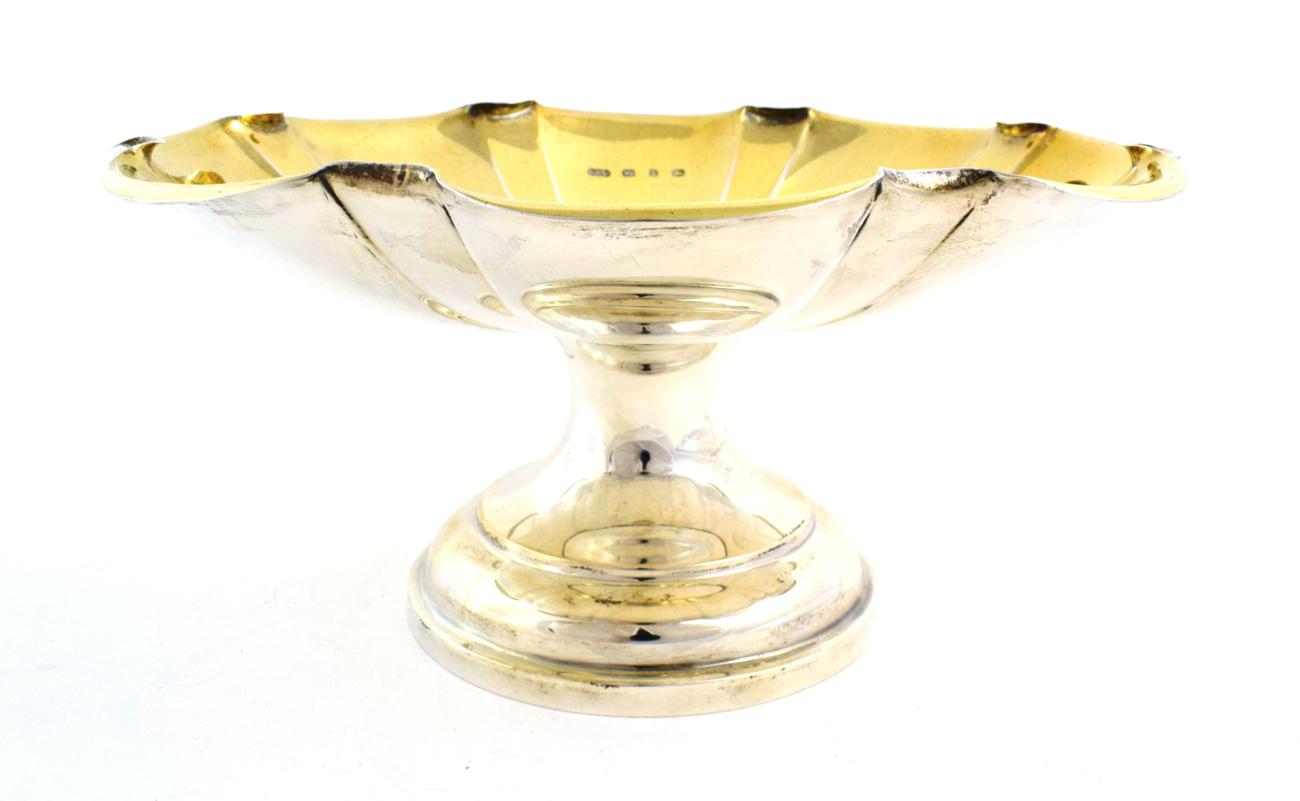 A Victorian Silver Pedestal Bowl, by Elkington and Co., Birmingham, 1897, with shaped circular