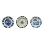 An English Delft Plate, circa 1750, painted in blue with a chinoiserie figure in a garden within a