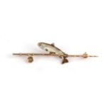 A Novelty Brooch, depicting a trout behind a fishing rod, the trout enamelled, length 6.4cm. The