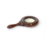 A Victorian Mahogany Magnifying Glass, with turned frame and handle, 26cm long