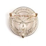 A Belle Epoque Diamond and Seed Pearl Brooch, of foliate trefoil form within a circular frame, set