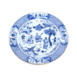 A Chinese Porcelain Dish, Kangxi, of circular form, painted in underglaze blue with musicians within