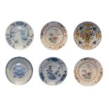 An English Delft Plate, circa 1760, painted in blue with a chinoiserie landscape, 22.5cm diameter;