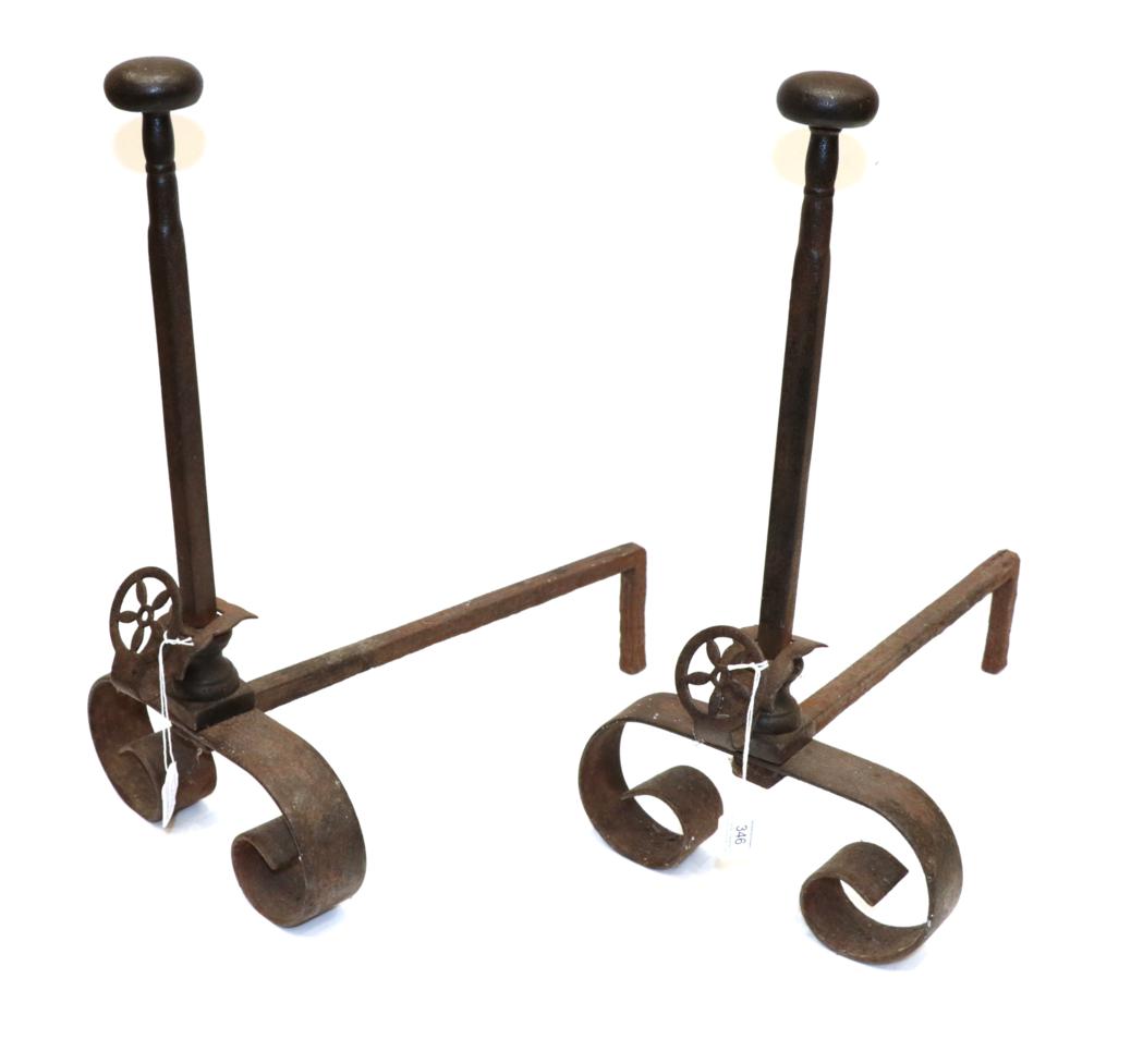A Pair of Andirons, 18th century, with ovoid knops and scroll feet, 53cm high