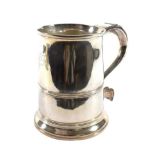 A George III Silver Mug, Makers Mark Rubbed ?*W, London 1765, plain tapering with reeded girdle,