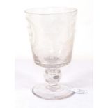 A Victorian Glass Coin Goblet, dated 1863, the bucket shaped bowl engraved with a portrait of a