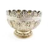 An Indian Silver Presentation Bowl, in the form of a monteith, the sides cast and chased with