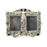 A Silvered Metal Double Photograph-Frame, Apparently Unmarked, 20th century, oblong, the mounts