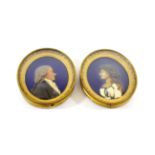 A Pair of German Wax Miniature Portraits of a Lady and Gentleman, circa 1797, bust length against