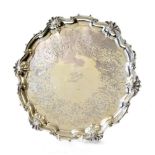 A Victorian Silver Salver, by John Samuel Hunt, London, 1854, shaped circular and with scroll and