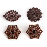 Two Garnet Brooches and A Pair of Earrings, a lozenge shaped cluster brooch of foil backed