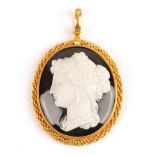 A Victorian Agate Cameo Pendant, depicting a portrait of a lady, in a rope effect frame, measures