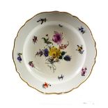 A Marcoline Meissen Porcelain Dish, circa 1780, of shaped circular form, painted with flower