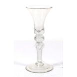 A Wine Glass, circa 1750, the bell shaped bowl on a double knopped air twist stem and circular foot,