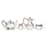 A Four Piece George V Silver Tea-Service and an Associated Edward VII Silver Teapot-Stand, the Tea-