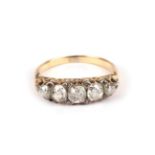 A Late 19th Century Diamond Five Stone Ring, the graduated old cut diamonds with pairs of tiny