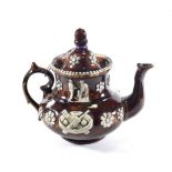 A Measham Bargeware Teapot and Cover of Cricketing Interest, circa 1890, of baluster form applied