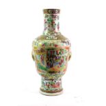 A Cantonese Porcelain Vase, 19th century, of baluster form with cylindrical neck and mask handles,