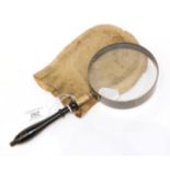 A Victorian Brass Mounted Double Lens Library Magnifying Glass, with turned ebonised handle, 26cm